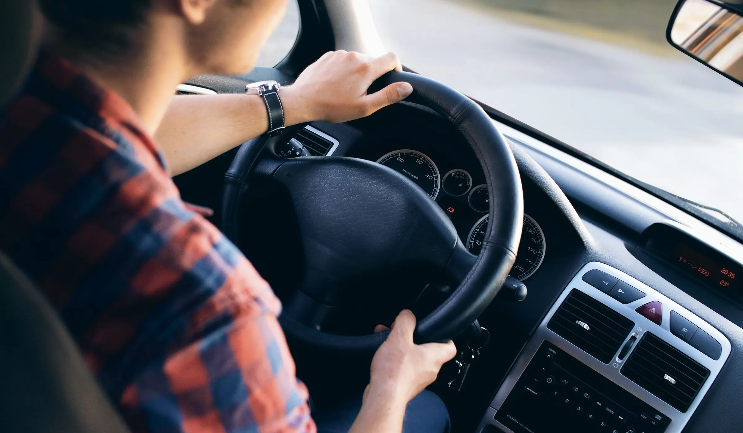 Driver at the wheel of a car bought on finance